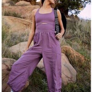 NWOT FP MOVEMENT righteous onesie in dark purple size XS